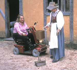 Woman on scooter playing quoits, an early American game